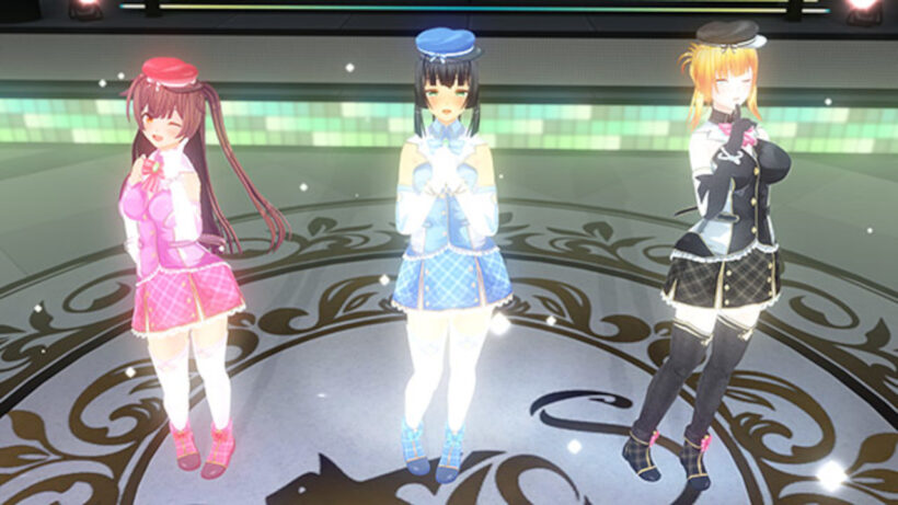 アイドル衣装でステージに立つ3人のアイドル